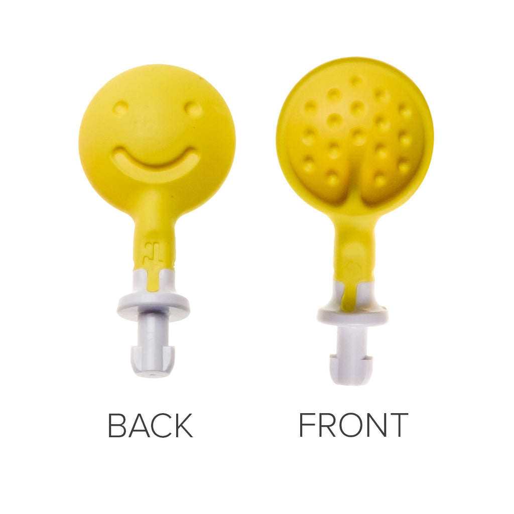 TalkTools Sensi Smiley Tips showing a smooth smiley face back and a textured front with raised bumps.
